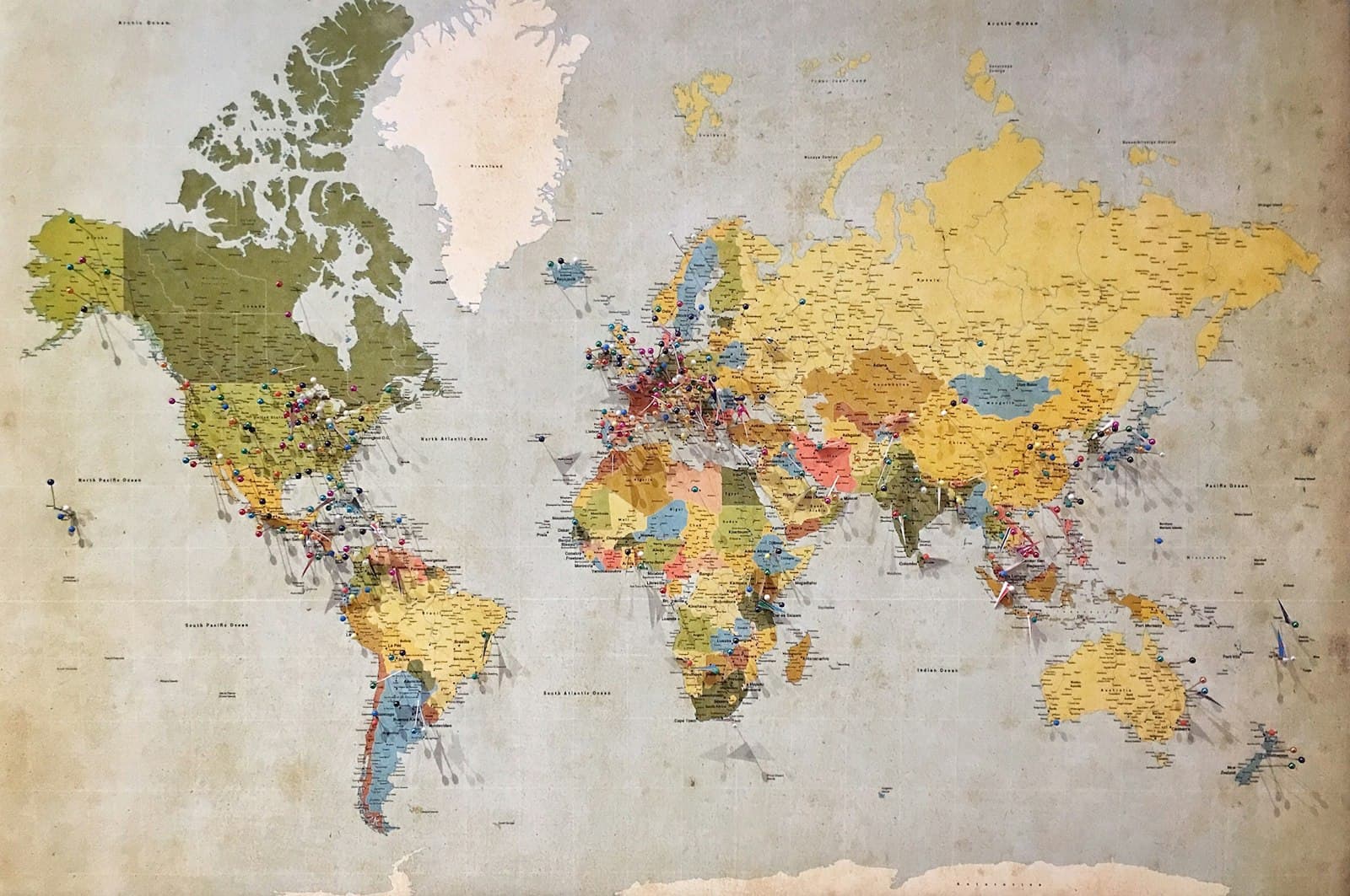 A wall map pinned with the locations a multi-site business serves